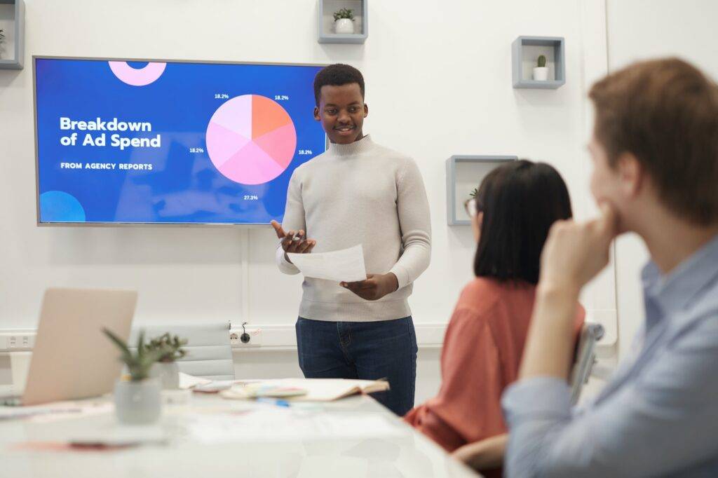 Young African Man Giving Presentation on Marketing