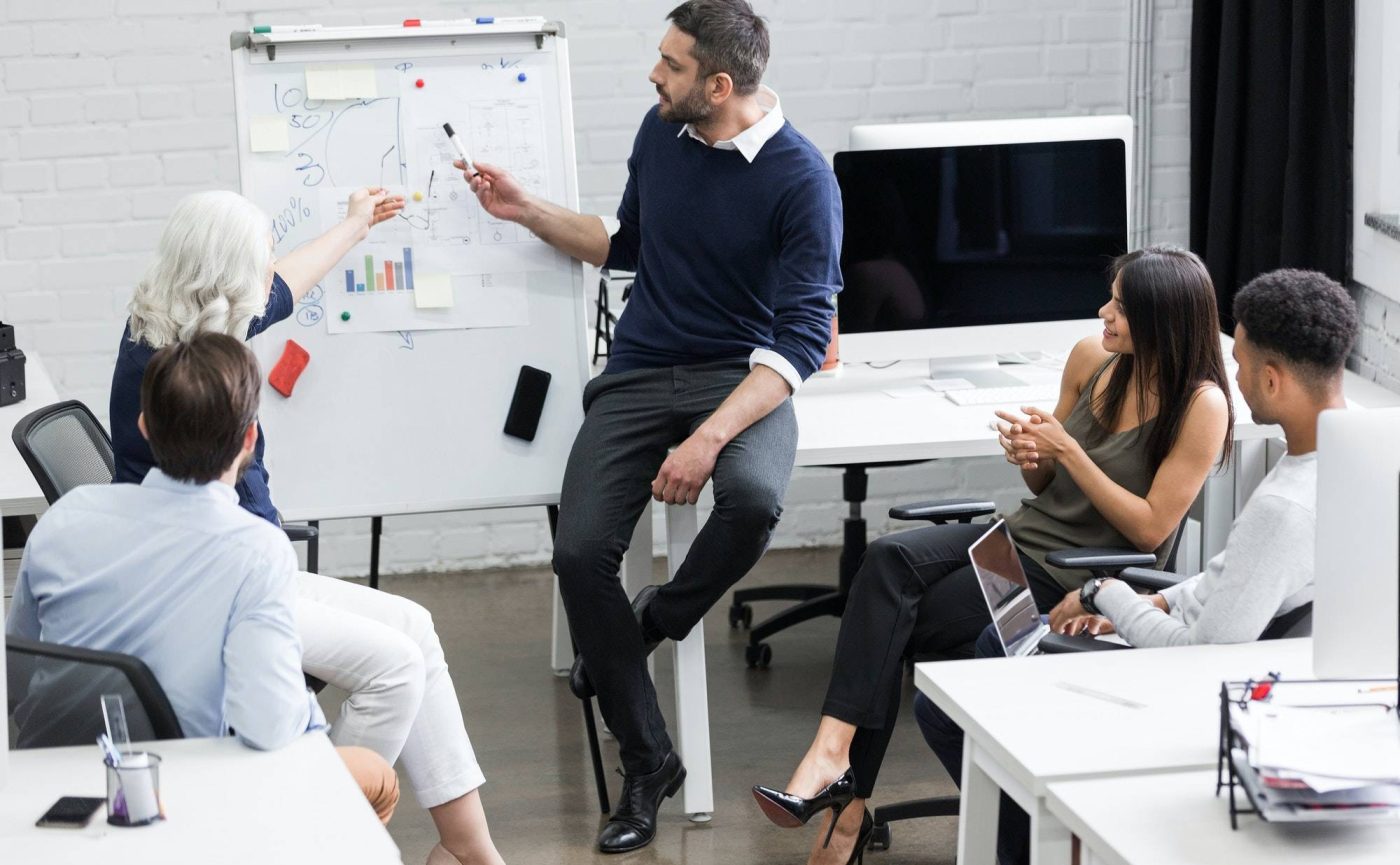 creative-people-sitting-at-table-in-boardroom.jpg